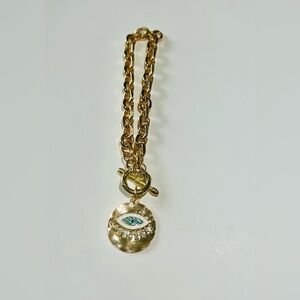 Gold-Tone Evil Eye Pendant Bracelet with Toggle Clasp